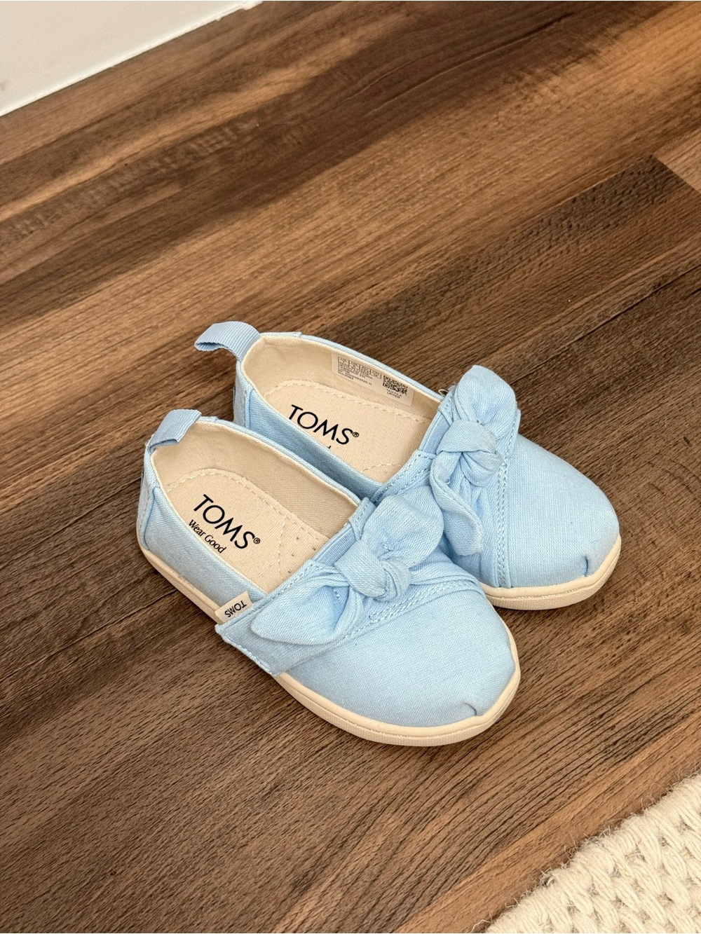 TOMS Kids Light Blue Canvas Slip-On Moccasins with Bow